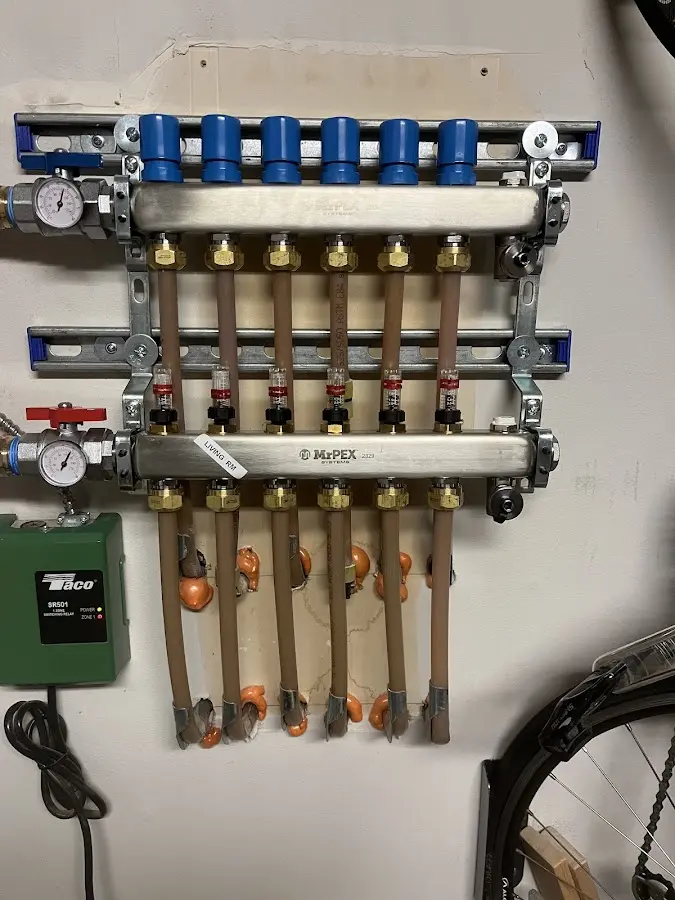 Plumber performing Water Heater Repair at a residential property in Valencia West